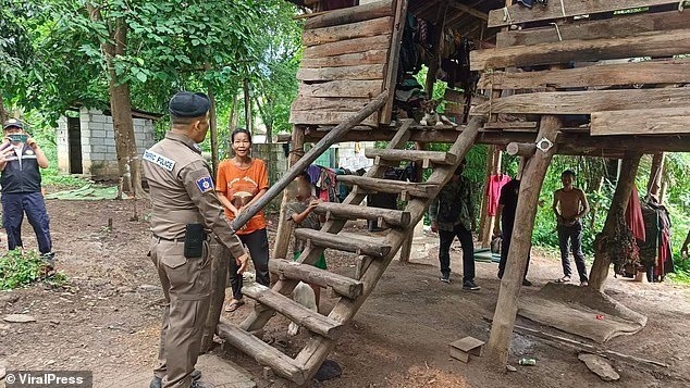 Thai police rescue eight-year-old boy living with dogs, unable to speak